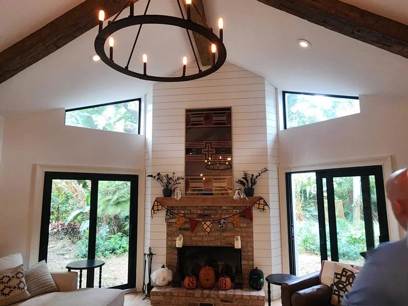 White impact windows installed on a stucco home